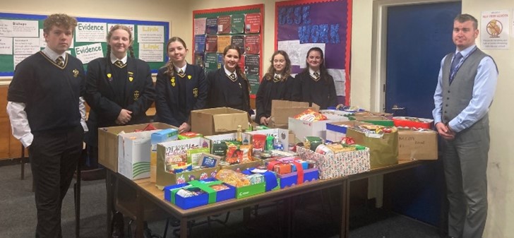 Photograph of pupils with RAFT Christmas Hampers